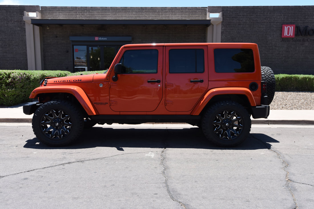Jeep JK Wrangler with level kit and aftermarket wheels